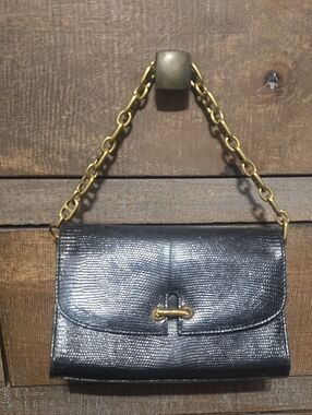 Gucci Elegant Vintage Snake Skin Black Textured Leather Clutch/bag